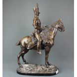 A bronze figure of an officer on horseback on a marble base, H. 59cm, base L. 36cm.