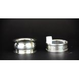 Two hallmarked silver napkin rings, dia. 4.5cm.