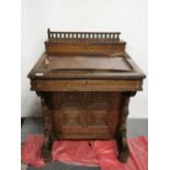A late 19th century oak Davenport desk, 67 x 62 x 94cm. A/F.