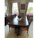 A superb hand-made reproduction Chippendale style dining table and eight chairs by G & T Woodcrafts