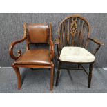 A wheelback oak chair together with an upholstered carver chair