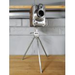 A vintage R.F. Hunter Ltd London Gilbert camera and tripod, overall H. 36cm.