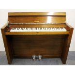 A Raymond Art Deco style upright piano and piano stool, 128 x 48 x 85cm.