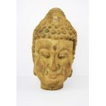An unusual old Chinese carved double faced Buddha and Arhat head with remnants of gesso and