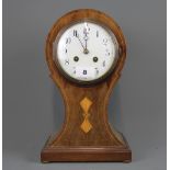 An Edwardian inlaid mahogany balloon clock, H. 31cm.