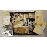 A box of photographs and ephemera.