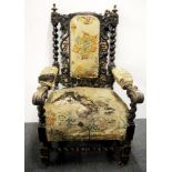 A 19th Century carved oak armchair.