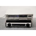 A vintage JVC radio cassette deck together with a Technosonic MT-PH02 turntable record player.