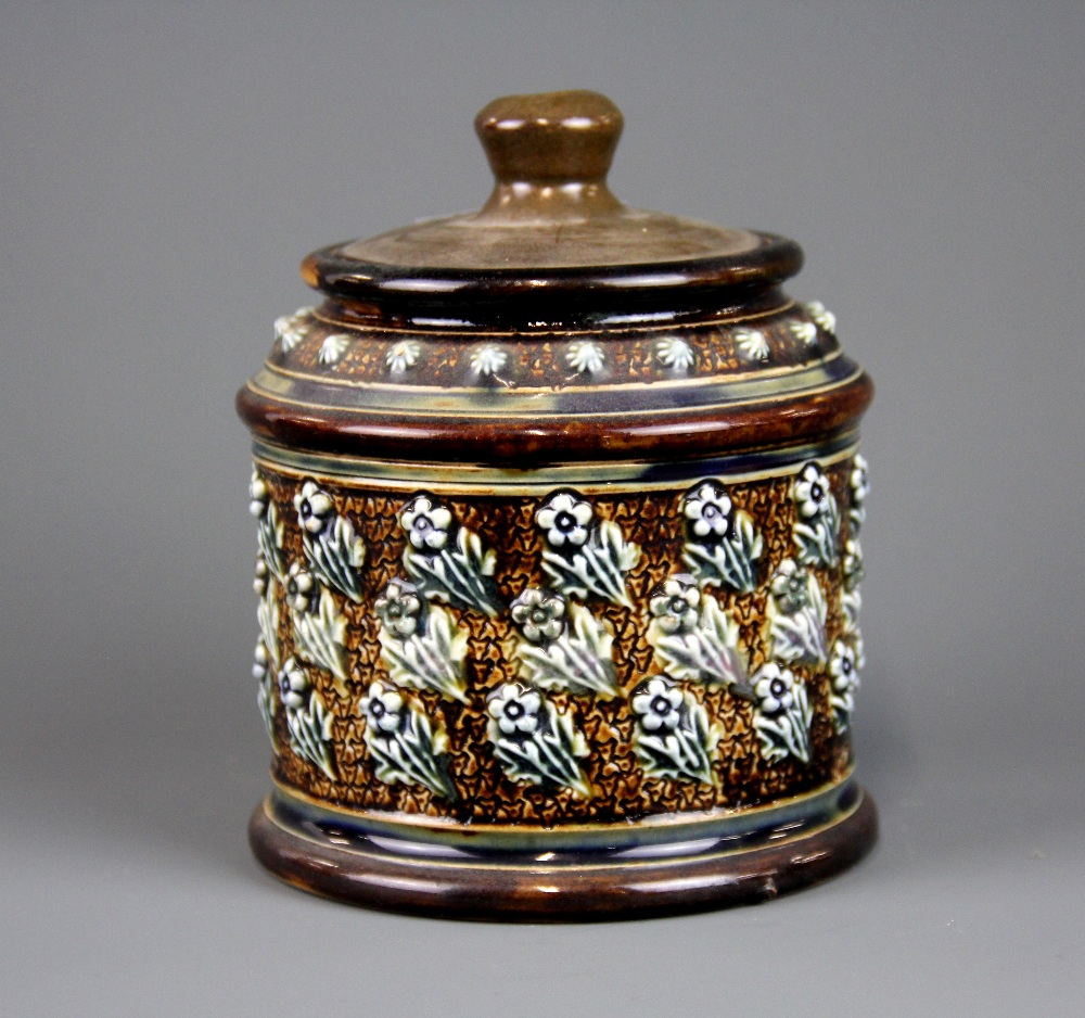 An Emily Welch Doulton Lambeth stoneware jar and lid, H. 13cm, Dia. 11cm. Condition : very minor