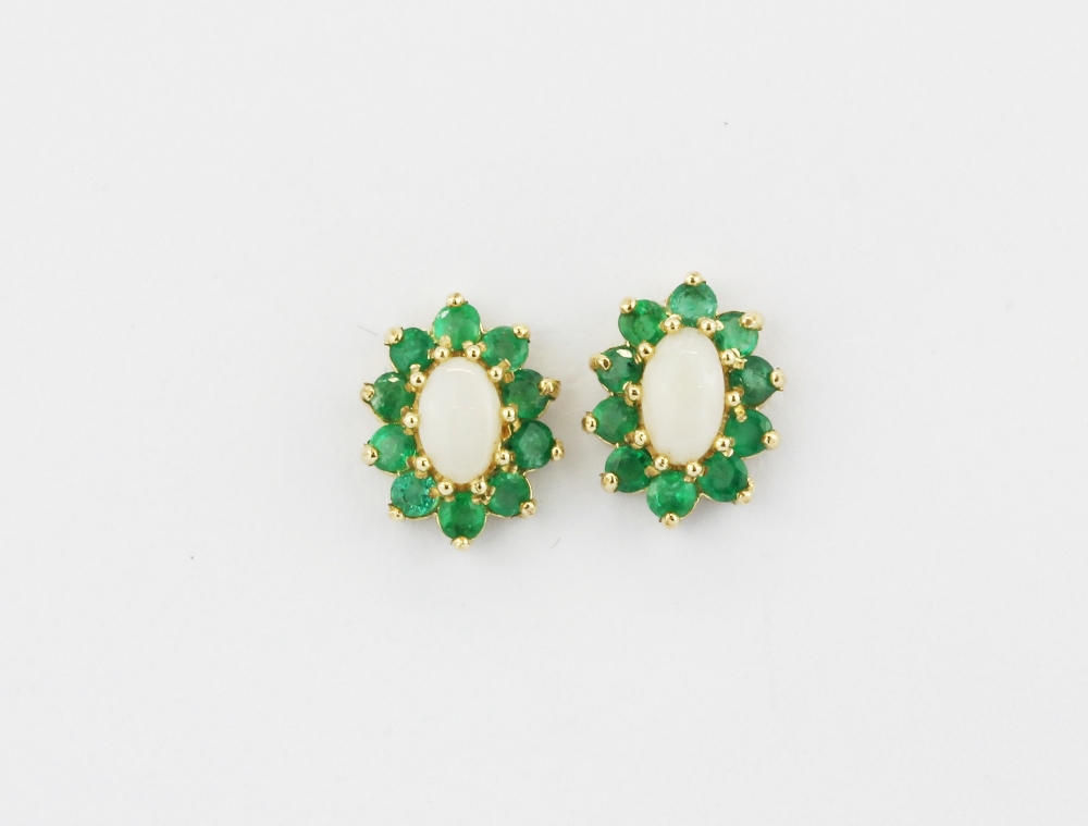 A pair of 9ct yellow gold opal and emerald set cluster earrings, L. 1cm.