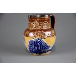 A hallmarked silver rimmed Doulton Lambeth jug decorated with willow pattern, assayed London c.