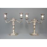 A pair of hallmarked silver candelabra, H. 26cm.