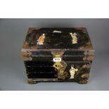 An oriental jewellery box and contents.