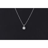 An 18ct white gold (stamped 750) pendant and chain set with a brilliant cut diamond, approx. 0.86ct,