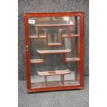 An oriental style wall mounted display cabinet, 38 x 51 x 8cm.