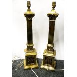 Two large gilt brass table lamps, 61cm.