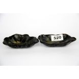 A pair of carved cattle horn lotus leaf shaped dishes, W. 12cm.