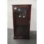 A mahogany veneered glazed cabinet, 49 x 44 x 96cm.