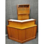 A 1970's teak home bar with matching wall cabinet, 126 x 100cm.