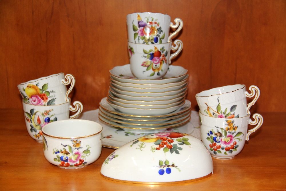 A Herend, Hungary part tea set together with a matching egg shaped box lid.