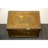 A hammered copper log box containing a quantity of vintage brass taps, etc.