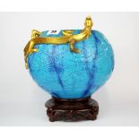 A hand painted and gilt porcelain dragon bowl with integral stand (possibly Minton), H. 27cm. A/F.