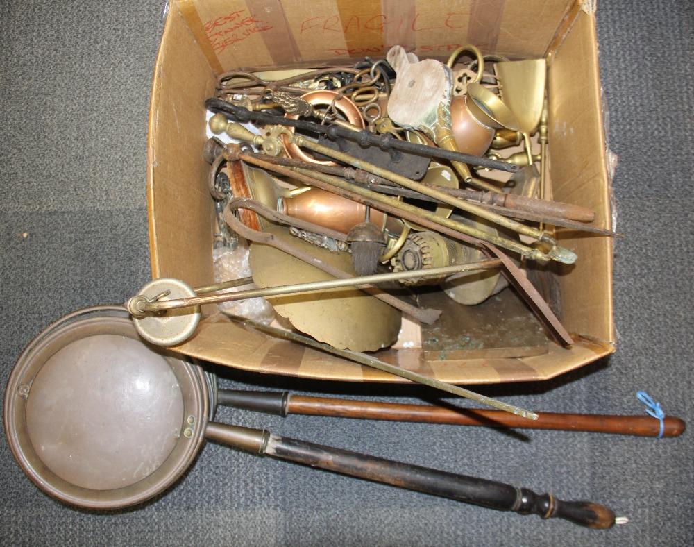 A box of mixed copper and brassware.