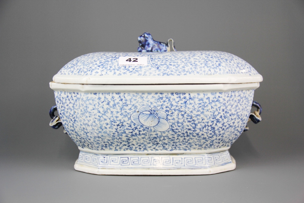 A 19th Century Chinese hand painted porcelain tureen and lid with lion dog and ribbon shaped
