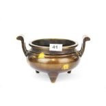 A superb Chinese bronze censor with gilt splash decoration, W. 24cm. H 14cm.