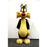 A hard composition plastic model of Sylvester the cat, H. 58cm.