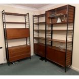 A vintage teak and metal ladderrax system comprising of five teak cabinets, 12 shelves and 6