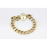 A 9ct gold flat curb bracelet with a heart padlock, approx. 13cm.