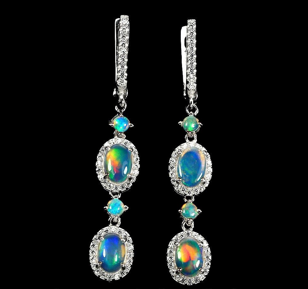 A pair of 925 silver drop earrings set with cabochon cut opals and white stones, L. 4.5cm.