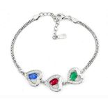 A 925 silver heart shaped bracelet set with oval cut emerald, ruby and sapphire, L. 16cm.