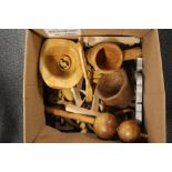 A box of interesting wooden items.