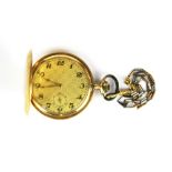 A 14ct gold outer cased pocket watch with engine turned decoration, ticking but not in full