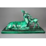 An original Art Deco glazed pottery model of a deer and fawn, W. 38cm, H. 32cm.