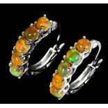 A pair of 925 silver hoop earrings set with cabochon cut opals, L. 2.2cm.