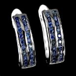 A pair of 925 silver sapphire chanel set earrings, L. 1.5cm.