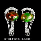 A pair of 925 silver opal and white stone set earrings, L. 2cm.