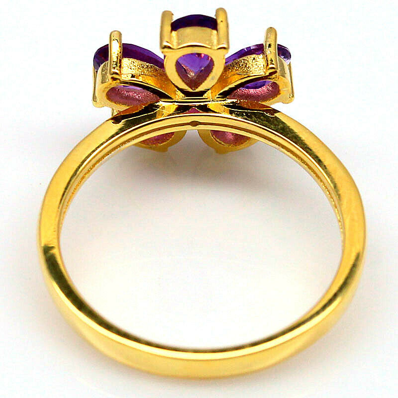 A pair of 925 silver gilt flower shaped rings et with amethyts, (P.5). - Image 2 of 2
