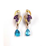 A pair of 925 silver gilt drop earrings set with pear cut blue topaz and marquise cut amethyts, L.
