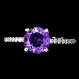 A 925 silver amethyst and white stone set ring, (M).