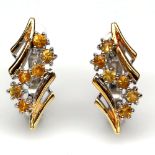 A pair of 925 silver gilt earrings set with fancy yellow sapphires, L. 2cm.