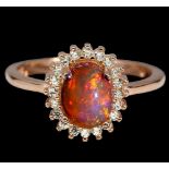 A matching 925 silver rose gold gilt cluster ring set with a cbaochon cut opal and white stones, (