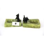 Two 1920's cold painted bronze and onyx Scotty dog ashtrays, largest 8.5 x 9.5 x 5cm.