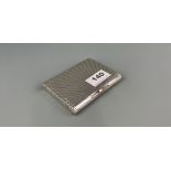 A lovely Danish Art Deco 830 silver cigarette case, 10.5 x 8 x 1.5cm, with rose metal detail.