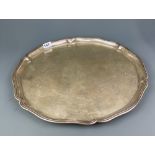 A large continental white metal tea tray tested approx. 800 silver, Dia. 46cm, weight approx. 1285g.