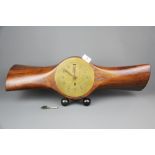 A World War II aeroplane propeller mantle clock, W. 63cm.