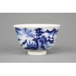 A fine Chinese hand painted porcelain tea bowl with underglaze blue and red decoration of a mountain